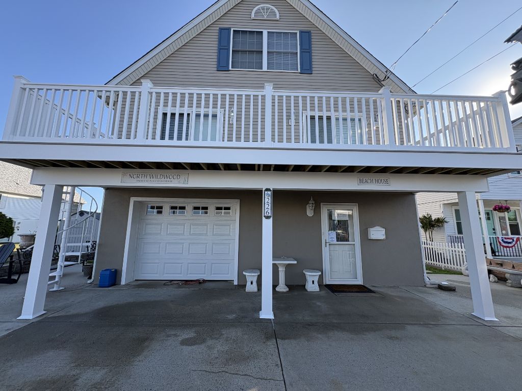 White railing deck on North Wildwood beach house front elevation