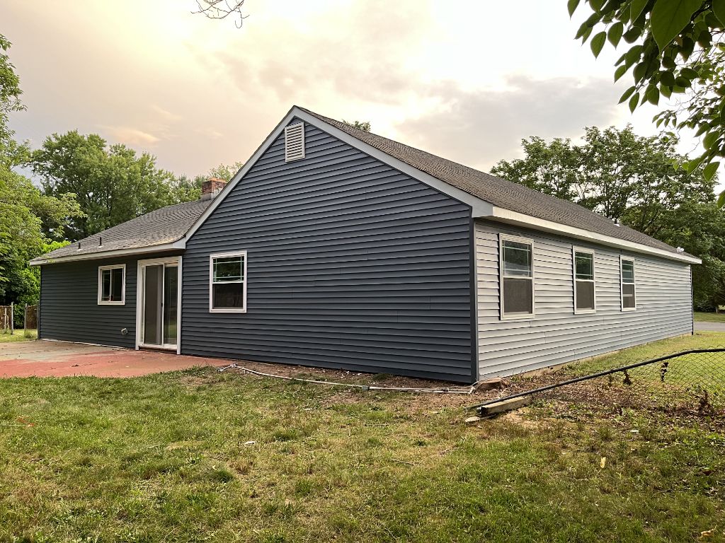 Wide shot of charcoal siding with two-tone exterior