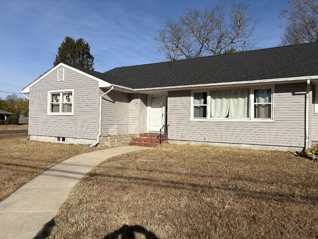 New gray vinyl siding installed on South Jersey ranch home